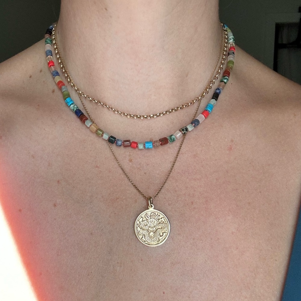 Handmade hand knotted little stone cylinder layering necklace.